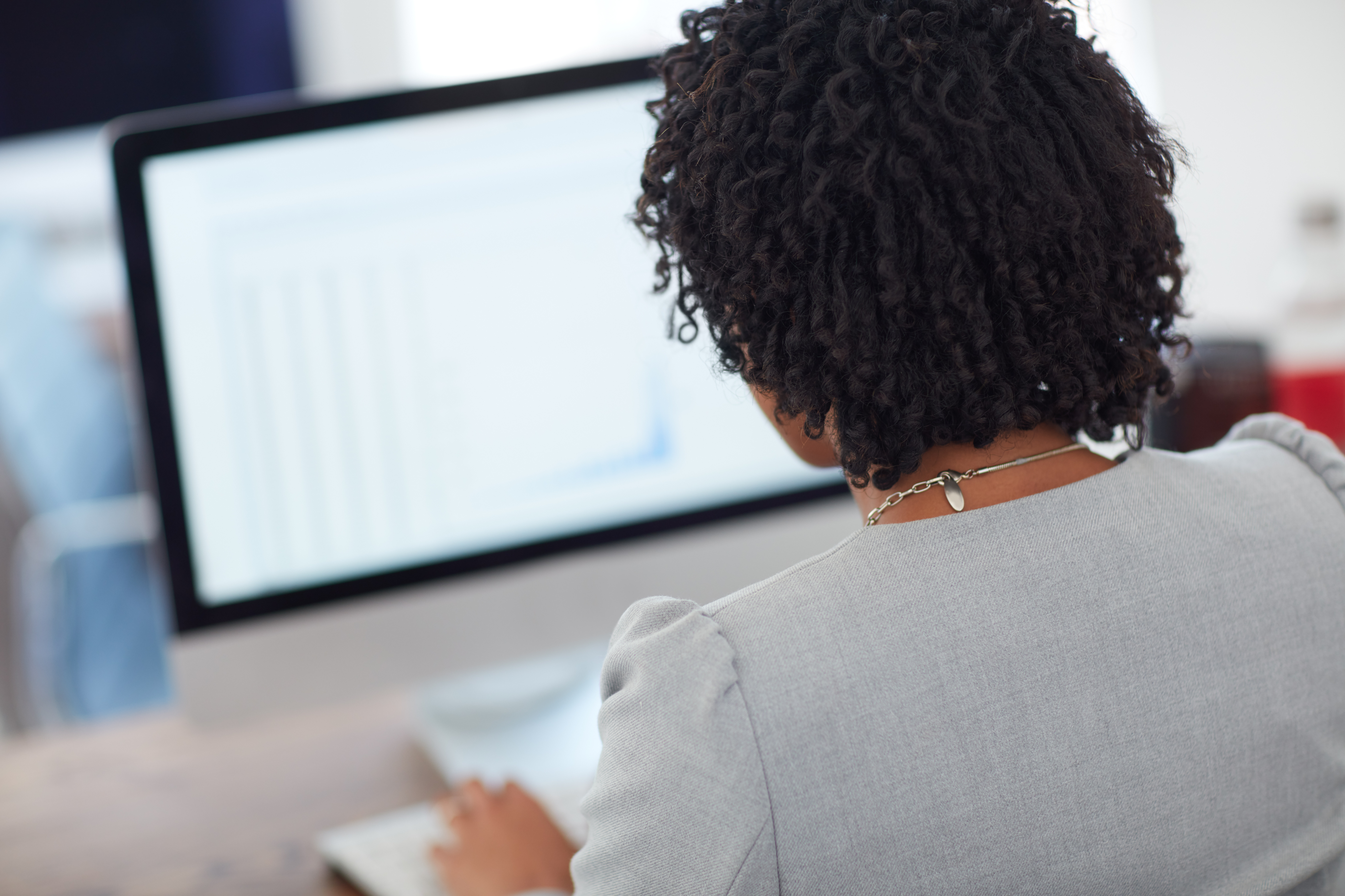 professional-woman-working-at-a-computer-in-a-mode-2026-09-25-04-55-59-utc